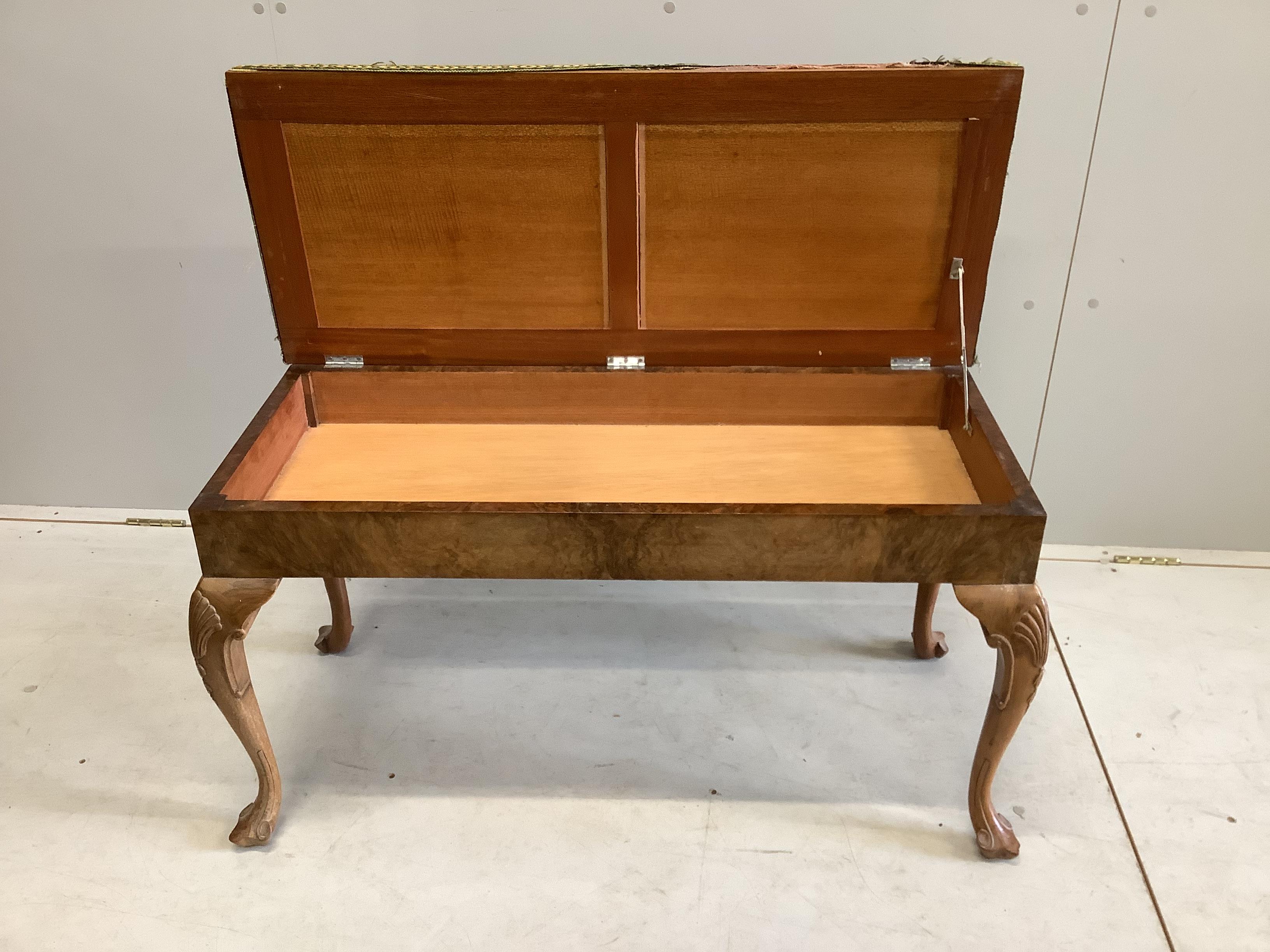 A Queen Anne revival walnut duet piano stool, with hinged box seat, width 93cm, depth 39cm, height 52cm, together with two window seats